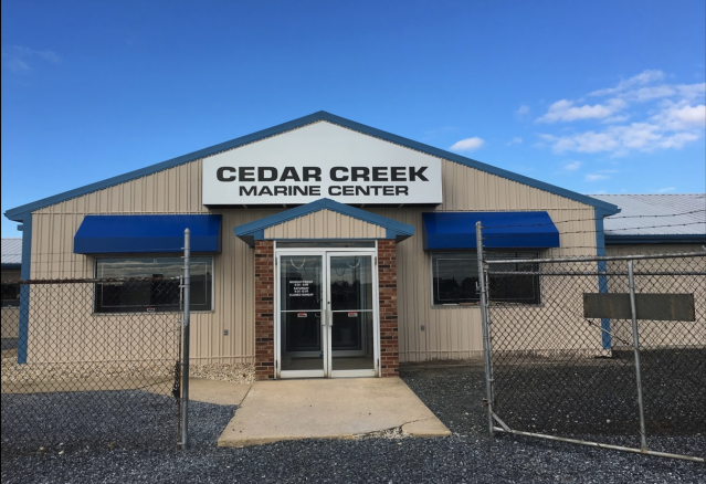 Cedar Creek Marine Center Entrance Cedar Creek Marina is a Robalo boat dealership located in Seaford, DE
